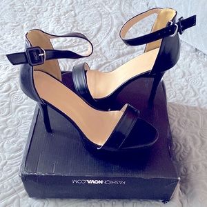 black platform stiletto heels, never worn in excellent condition.